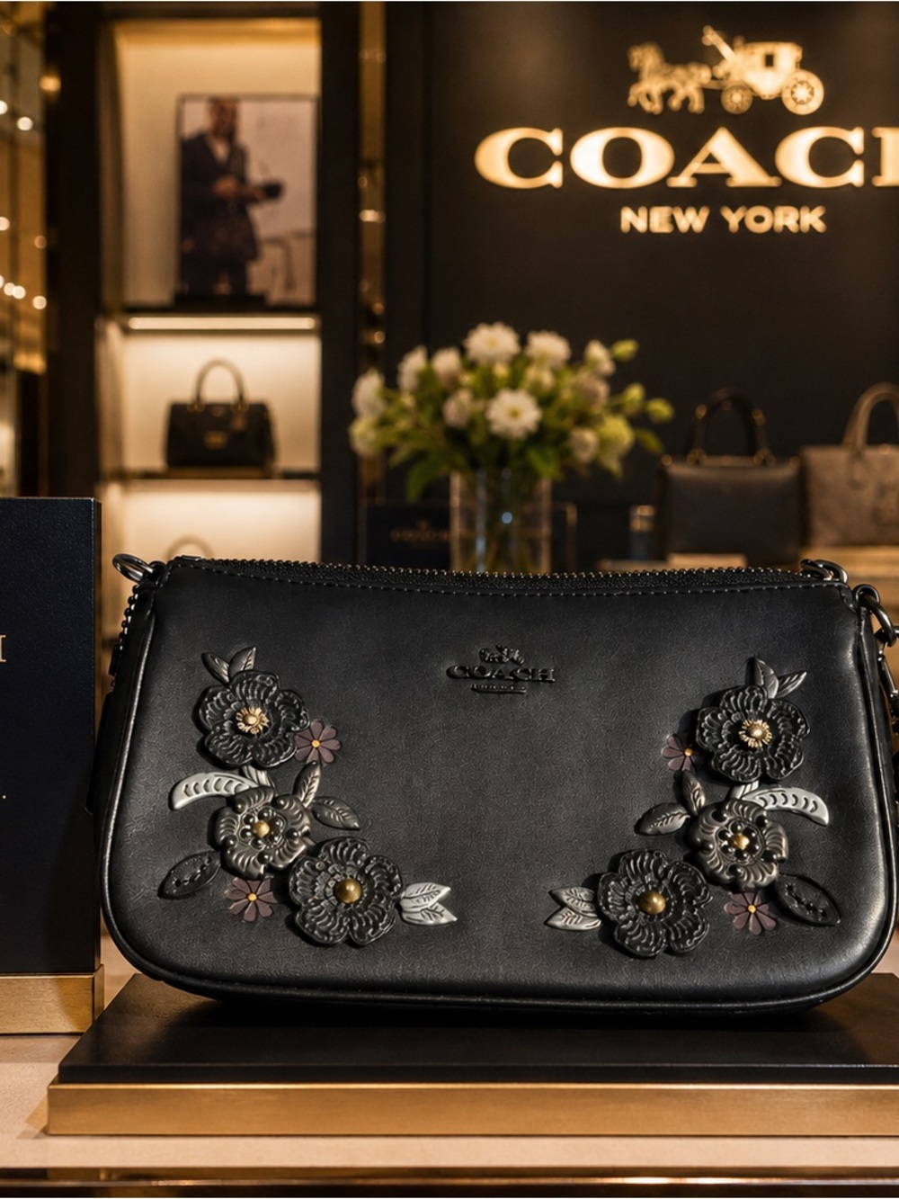 Coach Black Leather Shoulder Bag with Floral Appliqués